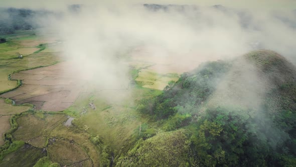 Philippines Misty Chocolate Hills Aerial View Mounts Peaks in White Haze of Low Clouds Landscape