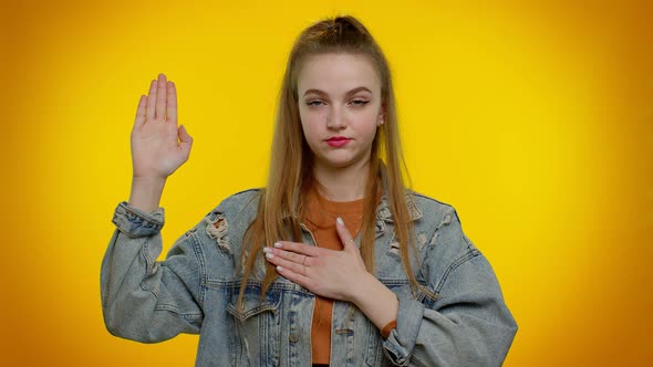Sincere Responsible Teen Girl Raising Hand to Take Oath Promising to Be Honest and to Tell Truth alt