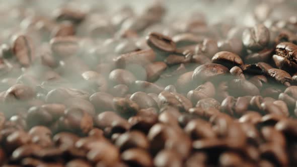 Coffe Beans Falling Down in the Oven for Roasting Process Smoke Coming Out alt