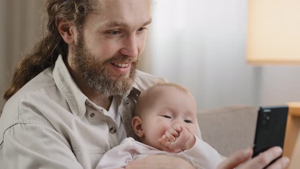 Bearded Parent Father Daddy with Little Daughter Son Girl Boy Child Baby Kid Infant Newborn Take alt