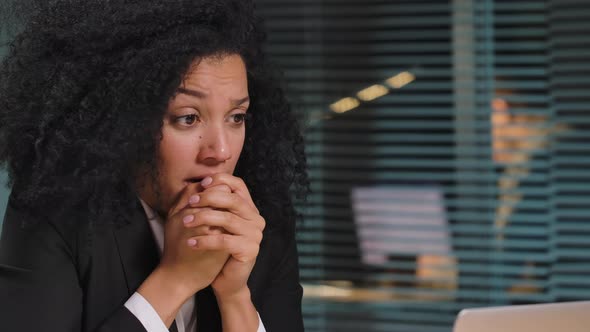 Portrait of African American Woman Talking Excitedly on a Video Call on a Laptop alt