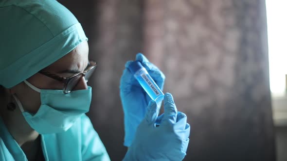 Doctor holding a recipient with the coronavirus COVID-19 vaccine