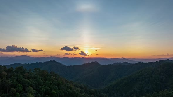 4K Timelapse of beautiful sunset with sun dog over the mountain alt