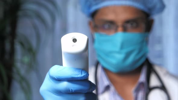 Doctor Hand with Thermometer Check Temperature. alt