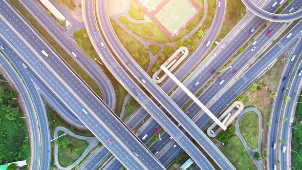 4K : Aerial hyperlapse drone shot of fast moving Highway road. Timelapse of cars alt