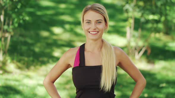 Fitness Woman Doing Squat Exercise at Outdoor Workout in Summer Park alt