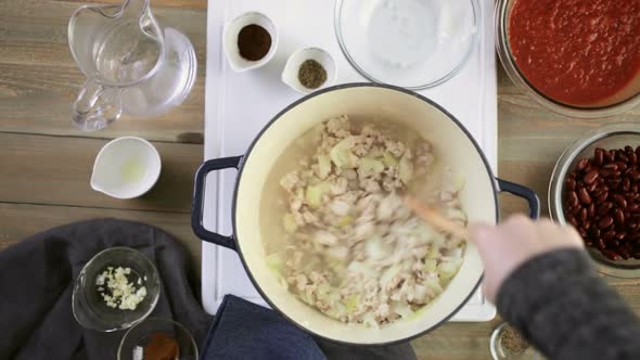 Step by step. Cooking homemade turkey chili for dinner. alt