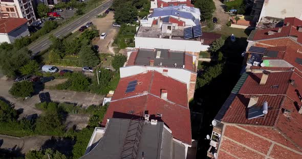 Drone Aerial View of the Red Roofs with Solar Panels on the South of Bulgaria