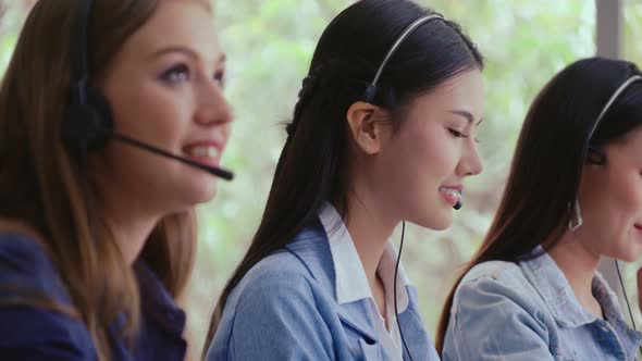 Customer Support Agent or Call Center with Headset Talking to Customer on Phone alt