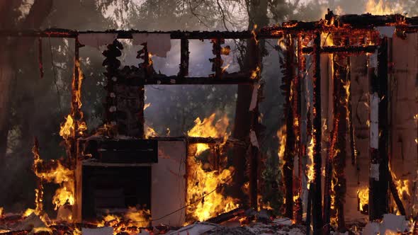 House on fire burning in slow motion alt