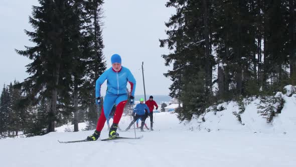 Group of young people are skiing