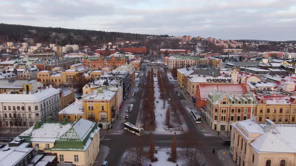 The bus traveling on Center of Sundsvall City, Sweden on Winter. aerial alt