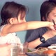 Little girl stealing meatball from her brothers plate during dinner - VideoHive Item for Sale