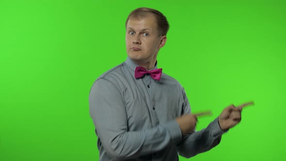 Man Showing Advertising Area. Looking Shocked, Pointing with Hands for Your Promotional Text, Logo alt