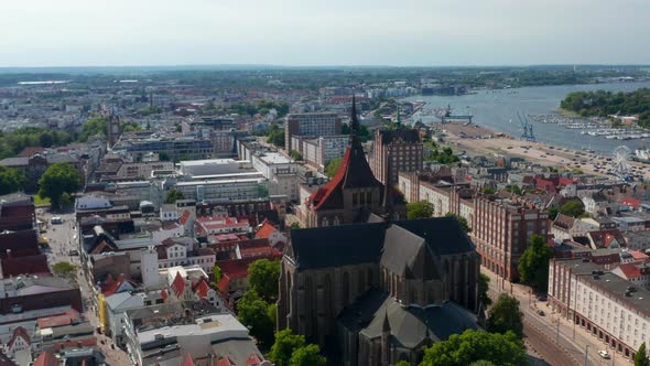 Backwards Fly Above City alt