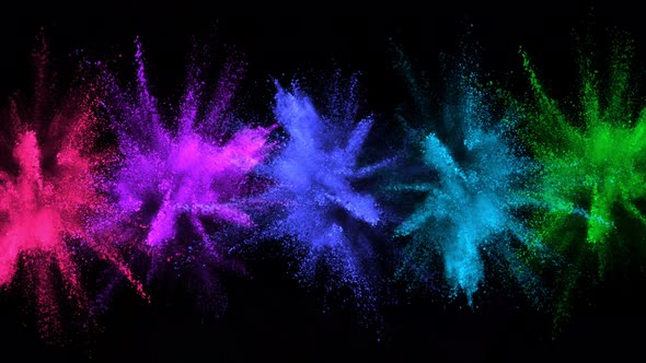 Super Slowmotion Shot of Color Powder Explosions Isolated on Black Background alt