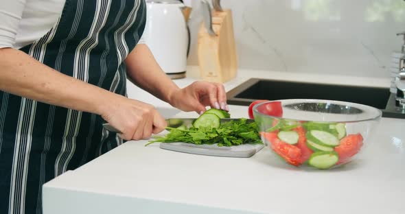 Woman Chopping Salad Closeup