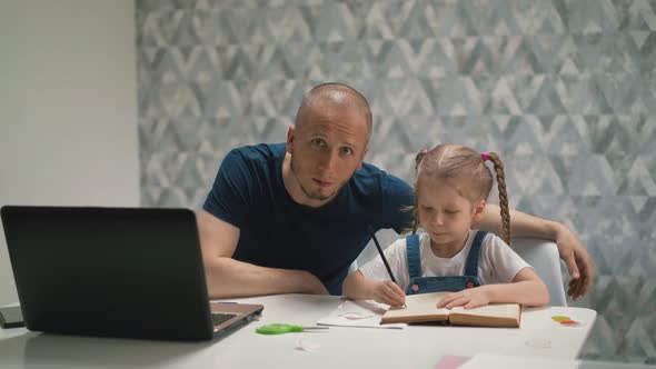 Dad Look Little Blond Daughter Doing Homework alt
