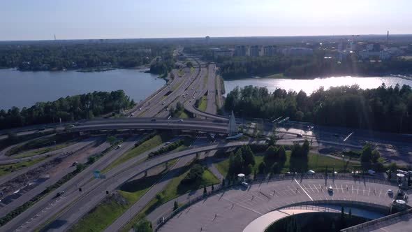The Aerial View of the Cars Passing the Roads of Lauttasaari in Helsinki Finland alt
