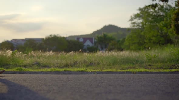 Slow Motion Shot of a Young Man Running Barefoot alt