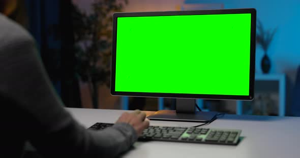 Woman Using Green Screen Pc