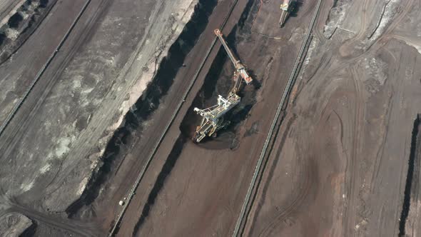 Rotation Around of a Mining Quarry of Coal or Natural Raw Material. Bucket Wheel Excavator alt