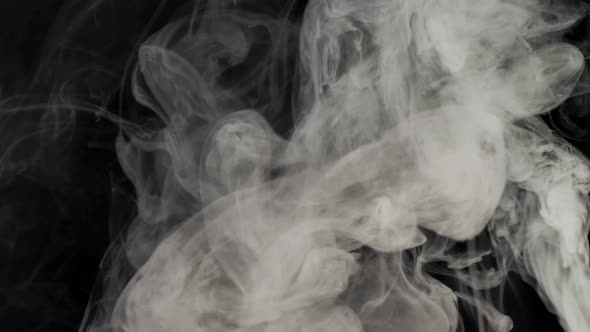 White smoke on a black background