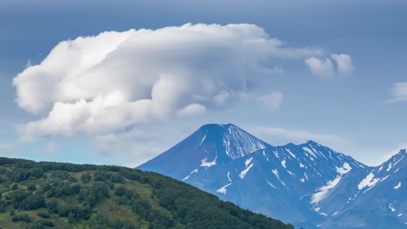 Lenticular Cloud Formation Over Volcano alt