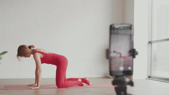 Woman Yoga Teacher Record Tutorial How to Do Downward Position in Yoga alt