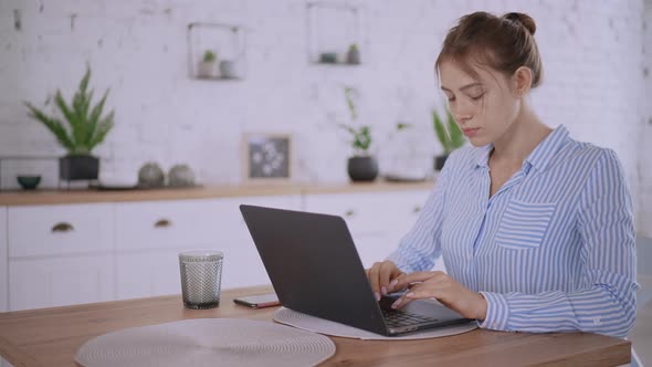 Female Entering Data on Computer