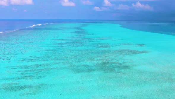 Blue Maldive Islands Seascape with Cloudy Sky