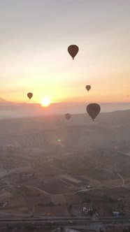 Vertical Video of Hot Air Balloons Flying in the Sky Over Cappadocia Turkey alt