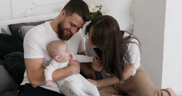 Happy smiling young family