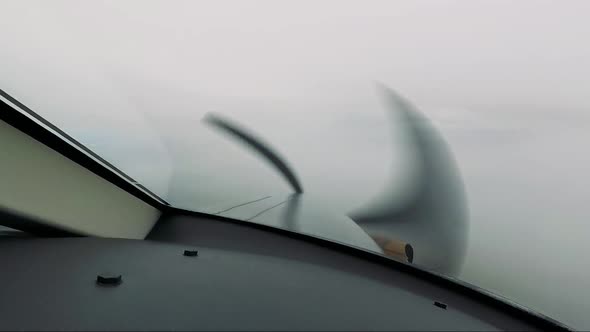 A Private Plane Flies Through the Clouds and Sees the Ground - a View From the Cockpit alt