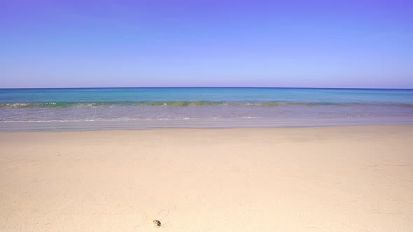 Phuket sea beautiful waves crashing on beach Aerial view waves break on sand beach alt
