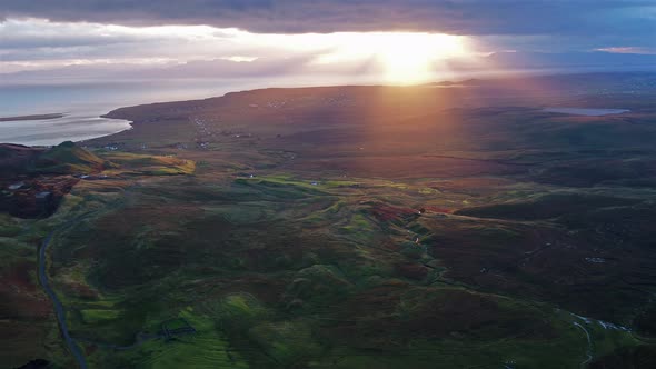 Cinematic Flight Over the Quiraing During Sunrise on the Eastern Face of Meall Na Suiramach, Isle of alt