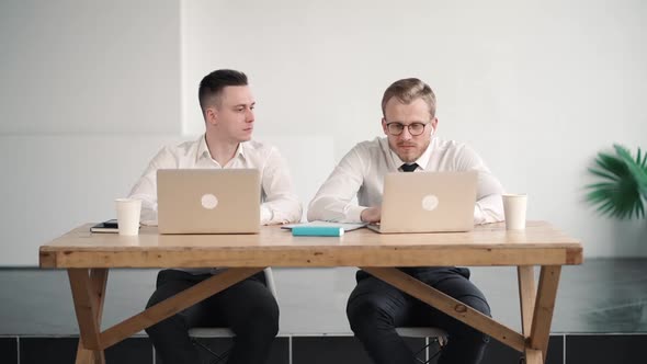 Two Male Partners Work Together in White Office Corporate Work of Businesspeople. Doing Project