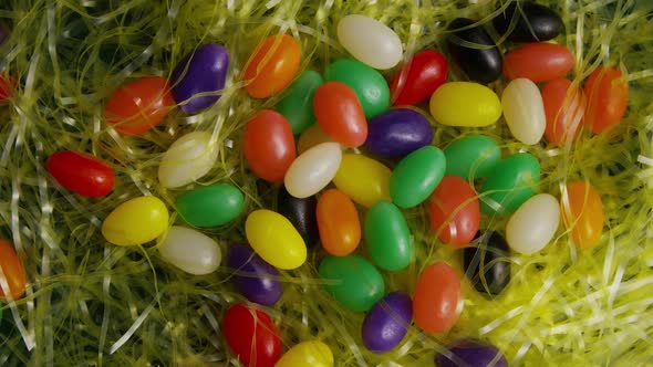 Rotating shot of Easter decorations and candy in colorful Easter grass - EASTER 006 alt