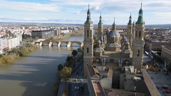 Aerial View of Basilica Del Pilar and Ebro River with Bridges in Zaragoza Spain alt