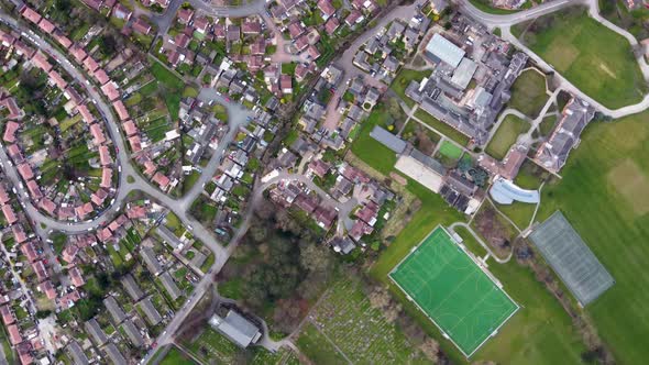 Straight down aerial drone footage of a Schools football pitches and playing fields alt