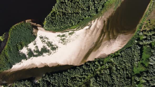 Beautiful Green and Yellow Uninhabited Island on the River Top View Aerial Shot