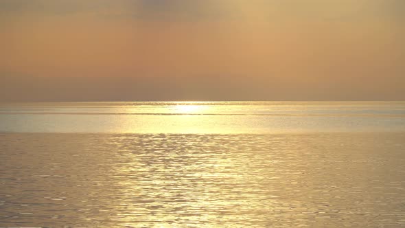 Solar Glare On The Sea At Sunrise alt