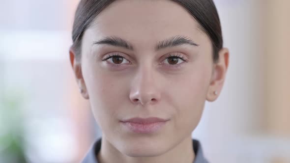 Face Close Up of Latin Women Looking at the Camera alt