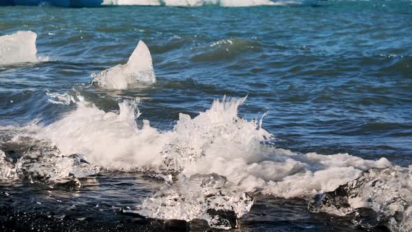 Melted Ice Forms On Shore Of Glacial Lake Of Jokulsarlon alt