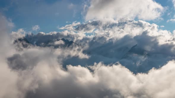 View of Mountains surrounded by clouds