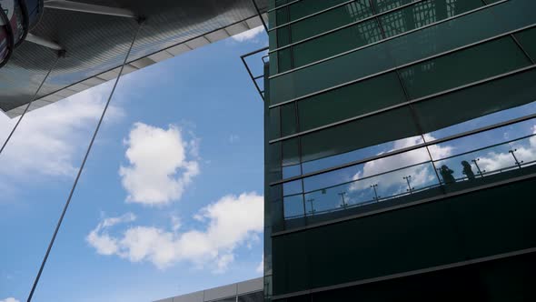 Two Girls Talking Woman Silhouette Building Reflection Cloud Sky Blue Black Abstract Urban City alt