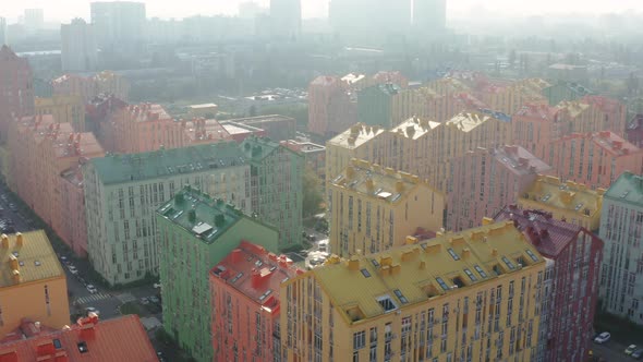 Top view of the colorful modern buildings, aerial footage from the drone alt