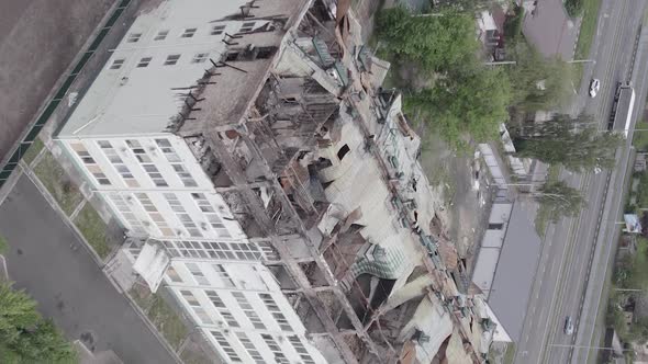 Vertical Video of a Wardamaged Apartment Building in Ukraine alt