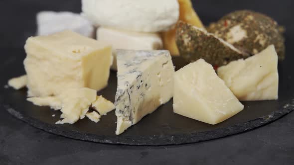 Various Types of Flavored Cheese on a Plate