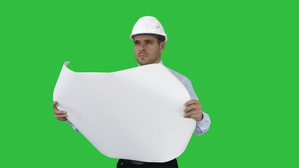 Engineer checking construction plan with what is built alt